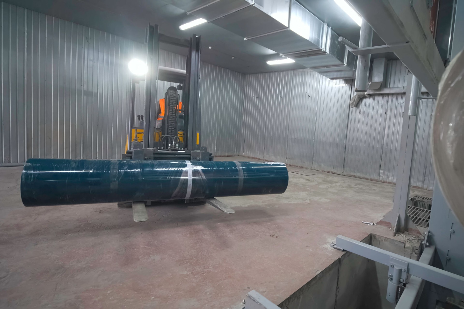 Transportation of coil for lifting. Company trucks at the factory.